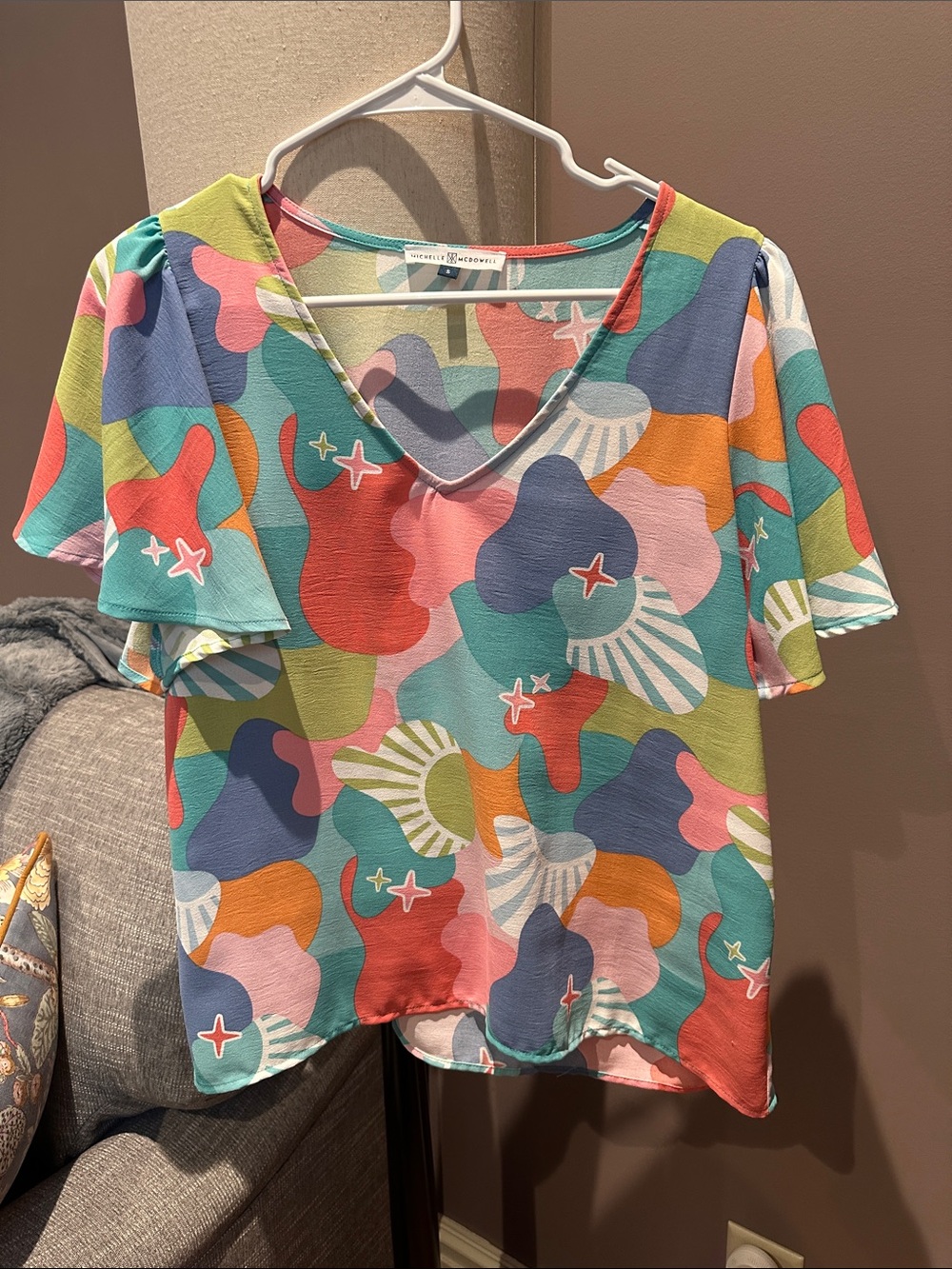Abstract Multi-Color V-Neck Flutter Sleeve Blouse